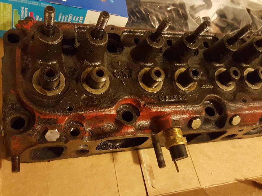 Semi-dismantled Chevy 250 head